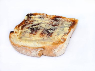 Bir dilim tereyağlı tost.