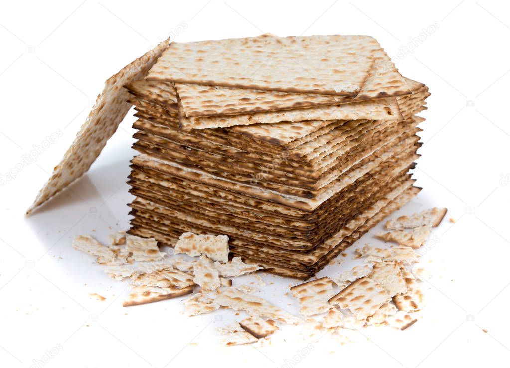 Pile of matza and some broken matza at the side