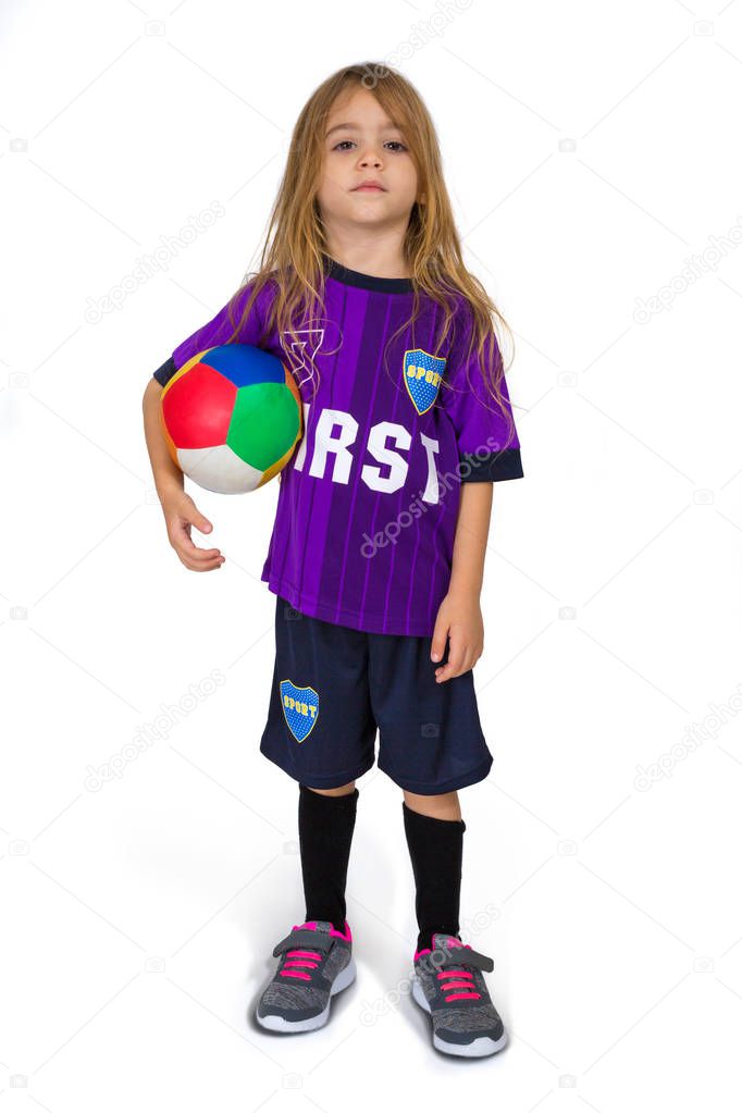 A four-year-old girl Tom Boy is dressed in the style of a footballer