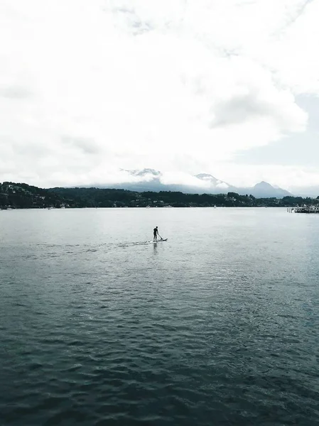 Distant View Person Floating Board River — Stock Photo, Image