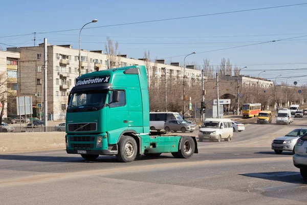 Truck with a tank for transportation of petroleum products rises on the bridge — Stock Photo, Image