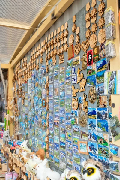 Souvenirs with images of attractions of Arkhyz in the shop local — Stock Photo, Image
