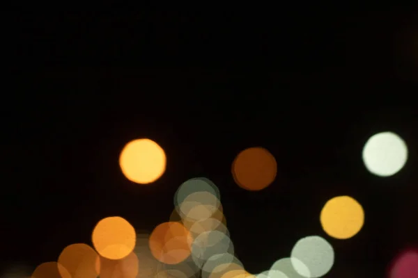 Gece şehir ışıklarının soyut görüntüsü. — Stok fotoğraf