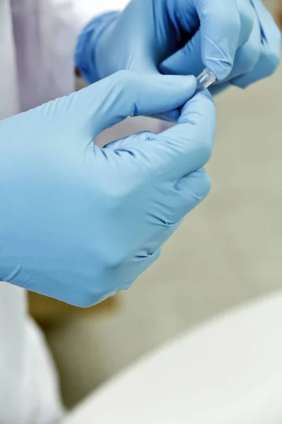 Scientist holding a test tube — Stock Photo, Image