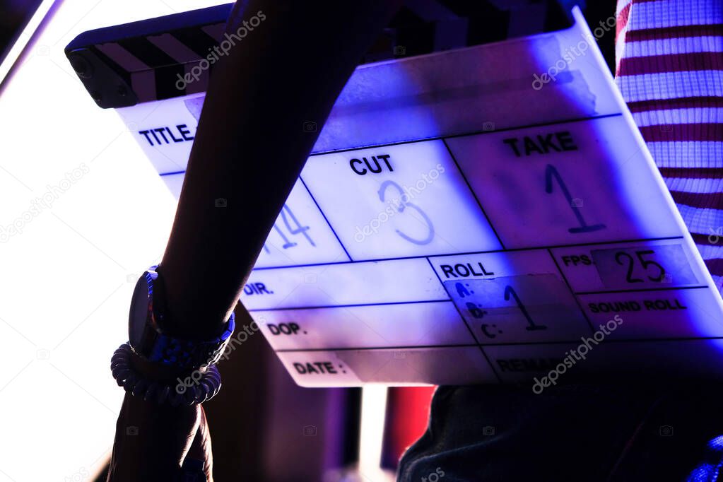 Film production crew, close up of movie Clapper board 