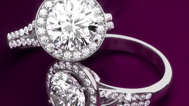 Diamantové prsteny na fialovém pozadí