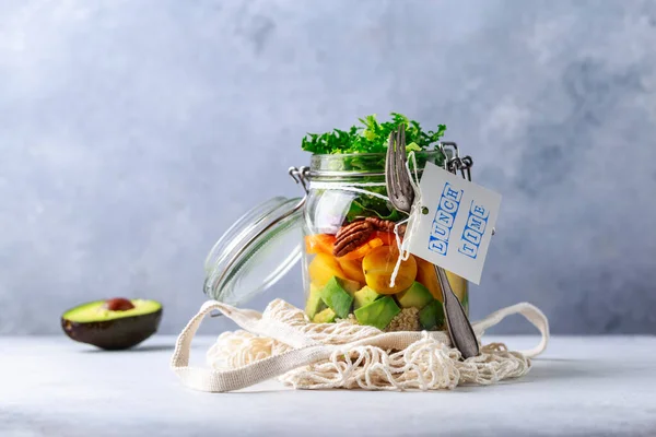 Homemade salad in glass jar with quinoa and vegetables with label lunch time no plastic and take away concept — Stock Photo, Image
