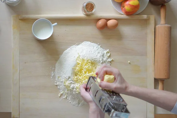 baking sour cake with a cocoa filling - grinding butter