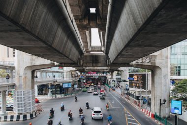 BANGKOK , THAILAND - DECEMBER 12, 2017: Cars and motorcycles on road in Bangkok, Thailand clipart