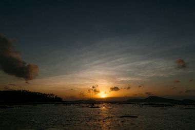 sunset over ocean clipart
