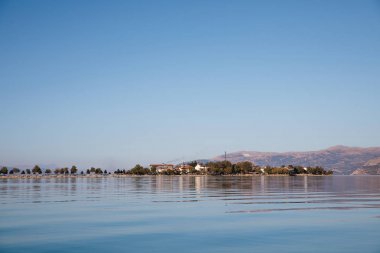 beautiful cozy village on coast at lake egirdir, turkey clipart