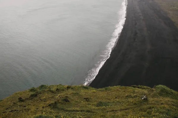 Black sand — Stock Photo