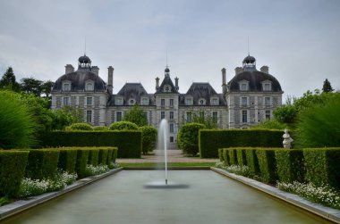 Cheverny, Loire Valley, France. 26 June 2017 at 12:00. View of the back faade from the beautiful gardens to the faade. clipart