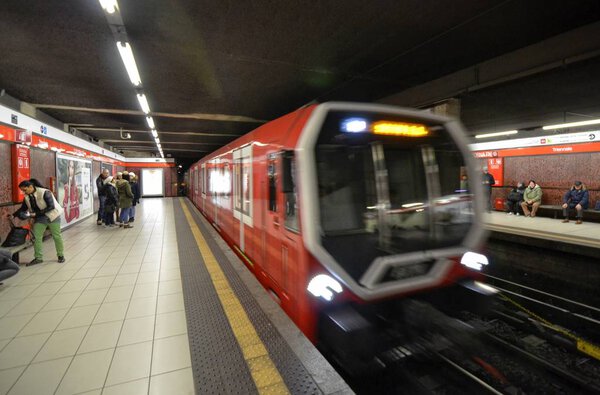 Milan, Italy, Lombardy December 30 2017. The Milan metro, arrival of the convoy and departure.