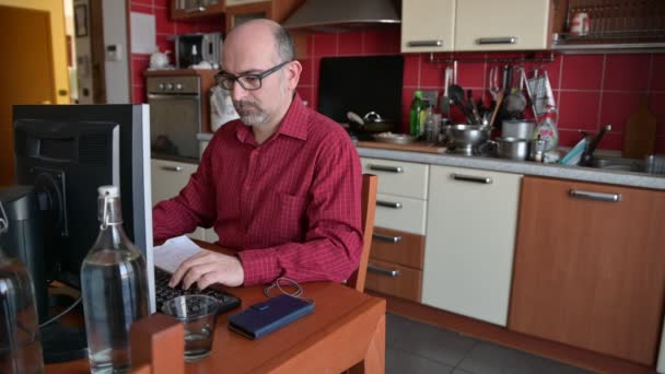 Coronavirus Pandemic Caucasian Man Has Set Workstation Home Kitchen — Stock Video