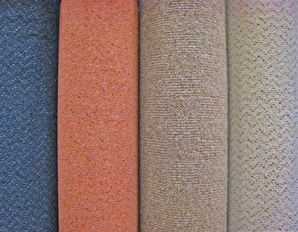 Carpet rolls  Four  different coloured rolls of carpet