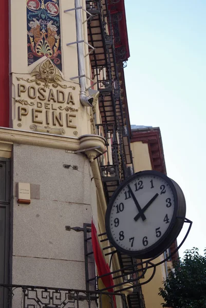Clock on Calle Postas, Madrid, Spain