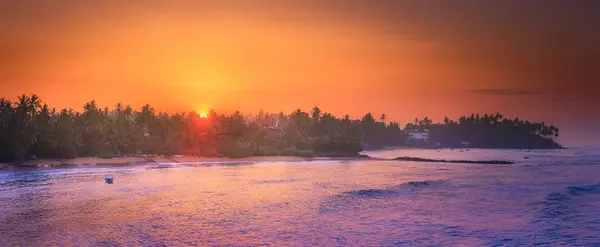 Tropical beach on sunset — Stock Photo, Image