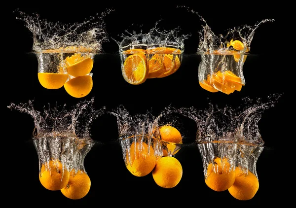 Gruppo di frutta fresca che cade in acqua — Foto Stock