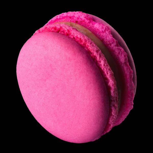 Macro photo of french pink rose macaroon isolated on black with clipping path — Stock Photo, Image
