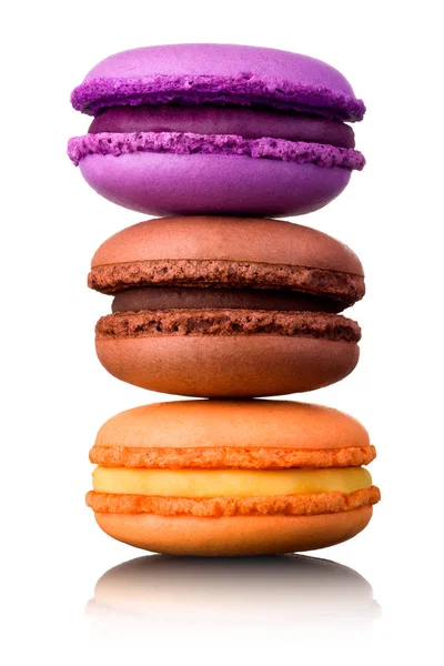 Stack of french colorful macaroons on table isolated on white background — 스톡 사진