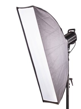 Photography studio flash with softbox isolated on white background with lamp.