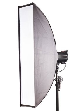 Photography studio flash with softbox isolated on white background with lamp.
