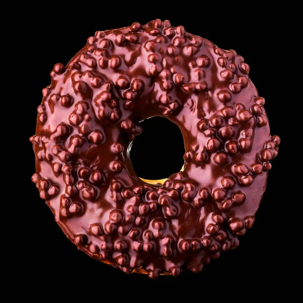 Schokolade glasierte Donut mit Streusel auf schwarzem Hintergrund gedreht — Stockfoto