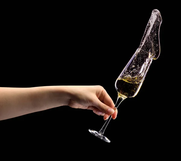 Woman Hand Holding Glass Sparkling Champagne Splashes Isolated Black Background — Stock Photo, Image