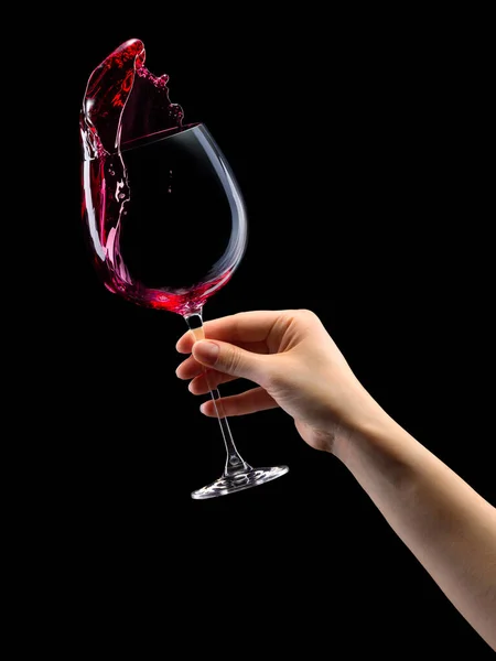 Woman Hand Holding Red Wine Glass Splashes Isolated Black Background — Stock Photo, Image