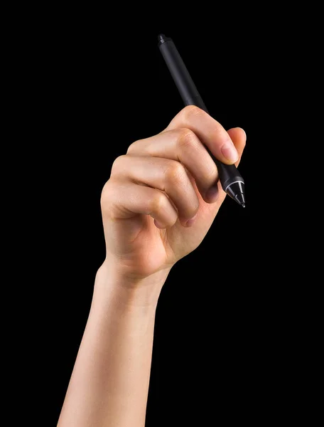 Ruka drží digitální grafické pero a kreslí něco izolovaného na černém — Stock fotografie