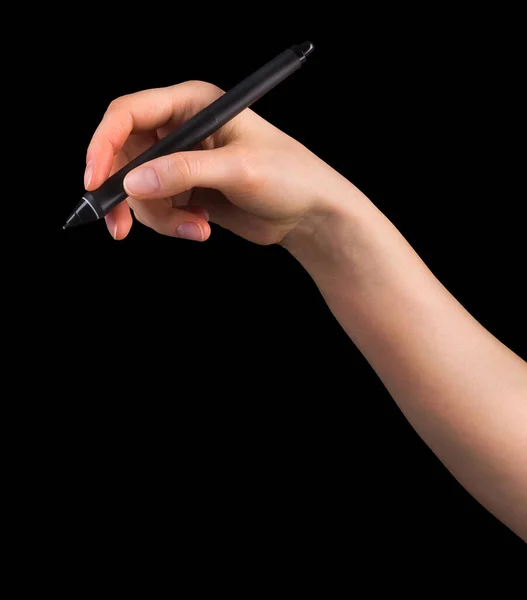 Mão segurando caneta gráfica digital e desenhando algo isolado em preto — Fotografia de Stock