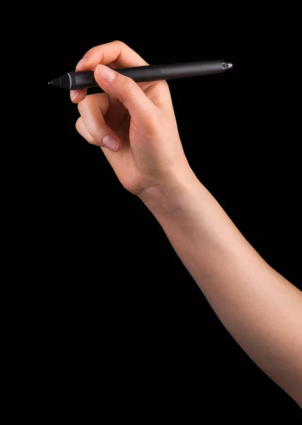 Mão segurando caneta gráfica digital e desenhando algo isolado em preto — Fotografia de Stock