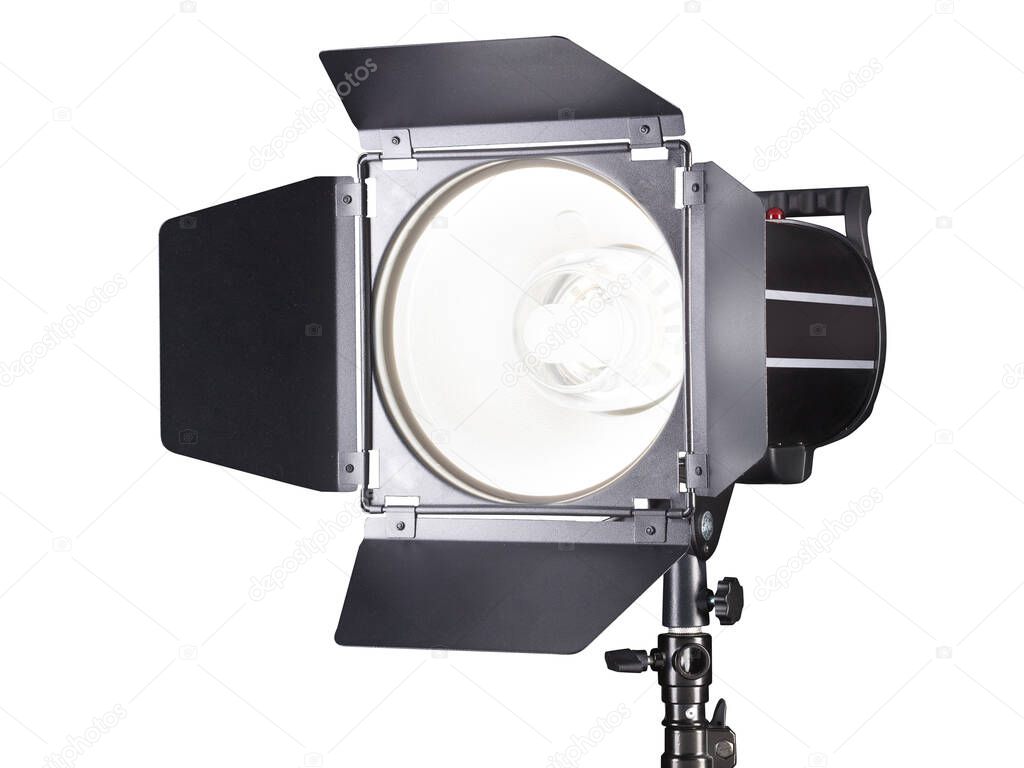 Photography studio flash isolated on white background with lamp.