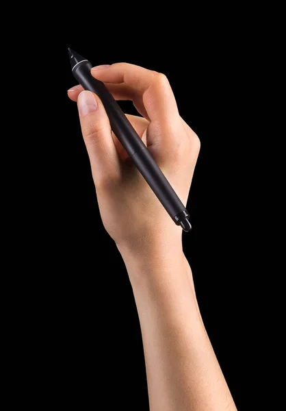 Hand holding digital graphic pen and drawing something isolated on black — Stock Photo, Image