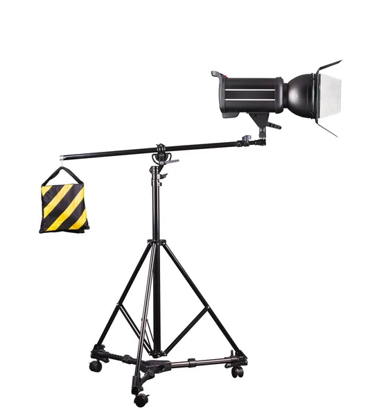 Photography studio flash on a lighting stand isolated on white background. — Stock Photo, Image