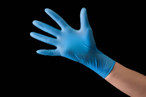 Lekarze w sterylnych rękawiczkach medycznych pokazują dłonie wyizolowane na czarno — Zdjęcie stockowe