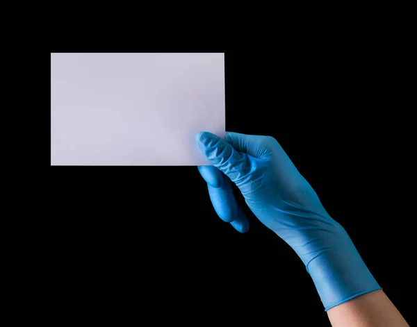 Doctor Hand Sterile Medical Gloves Holding Banner Isolated Black Background — Stock Photo, Image