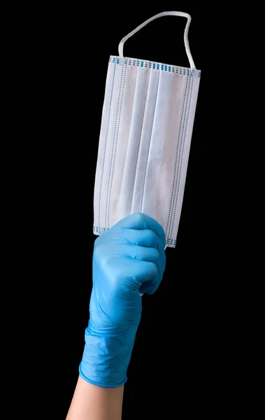 医生的手戴着医用手套 戴着面具 隔离在黑色背景下 有剪路 防止大流行病和病毒的概念 — 图库照片