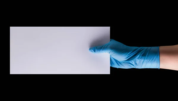 Doctor Hand Sterile Medical Gloves Holding Banner Isolated Black Background — Stock Photo, Image