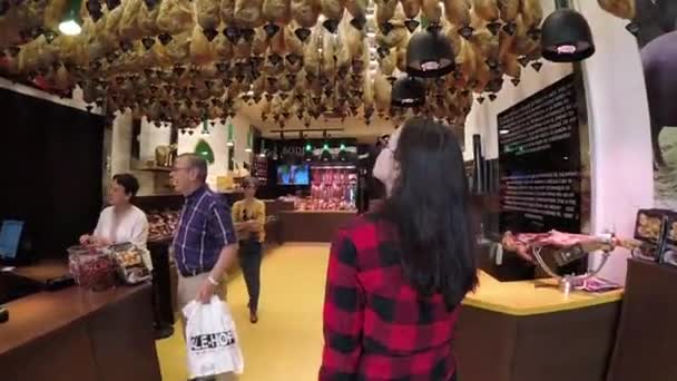 Indoors Traditional Spanish Jamon Store Madrid Tourist Buying Hanging Hamon Pork — Stock Video