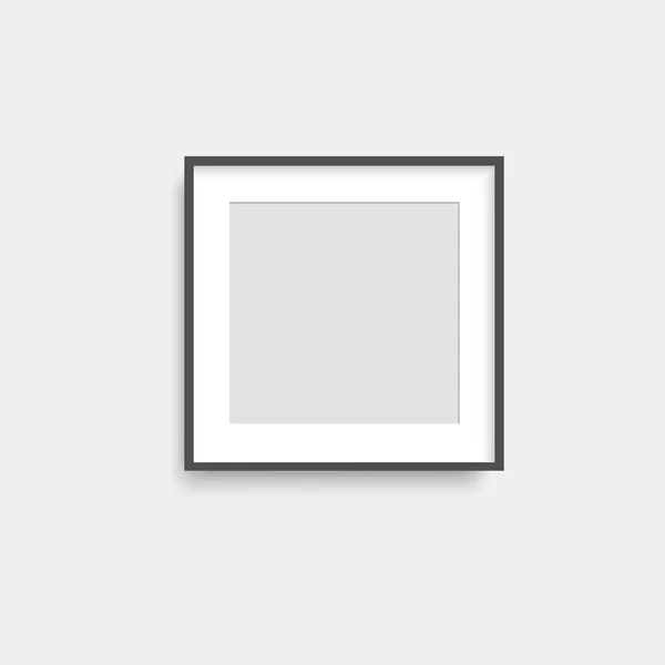 Realistic black square photo frame on grey wall. Vector. — Stock Vector