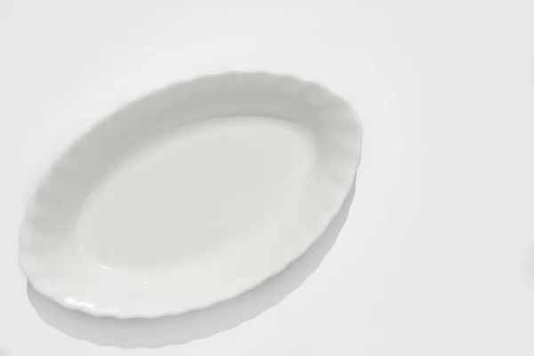 Empty White Long Oval Plate White Background Copy Space Top — Stock Photo, Image