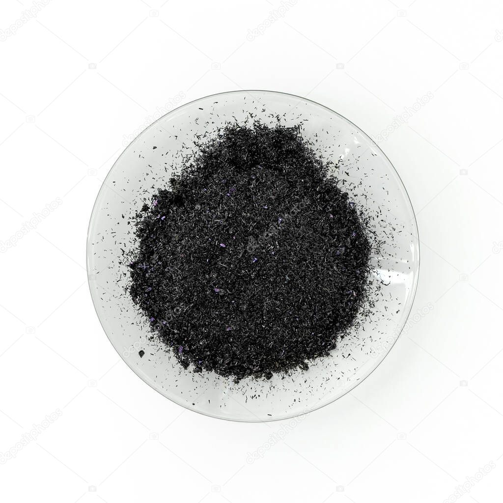 Close up inorganic chemical on white laboratory table. Potassium permanganate (KMnO4), a common chemical compound that combines manganese oxide ore with potassium hydroxide.