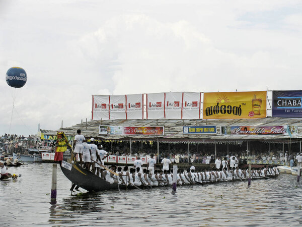 Punnamada lake, Alappuzha, Kerala. August, 2008. Held every year on the second Saturday of August. People gather in large numbers to watch nearly 100 ft long boats compete against each other to the tune of old boat songs on Punnamada lake