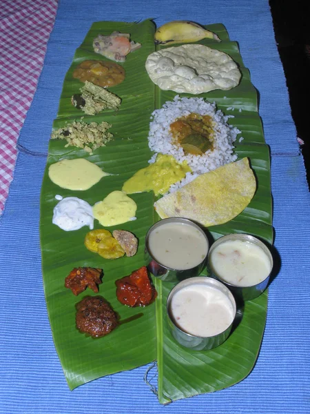 South Indian Thali (meals). Traditionally served on banana leaf. Kerala, India