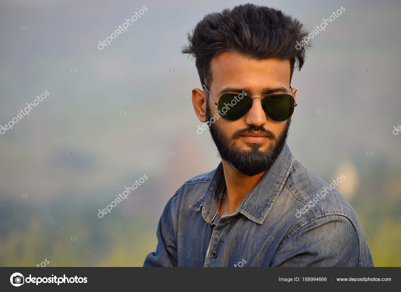 Indian Boy with sun glasses near mountain, Pune, Maharashtra ...