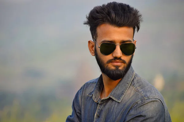 Indian Boy with sun glasses near mountain, Pune, Maharashtra. — Stock Photo, Image