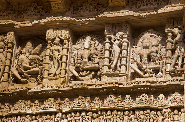 Carved idols on the inner wall of Rani ki vav,  an intricately constructed stepwell on the banks of Saraswati River. Patan, Gujarat, India