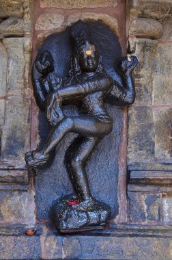 Black idol, on the way to Thanjavur, Tamil Nadu India clipart